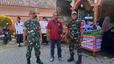 Babinsa Besuk Kawal Pawai Ancak Agung
